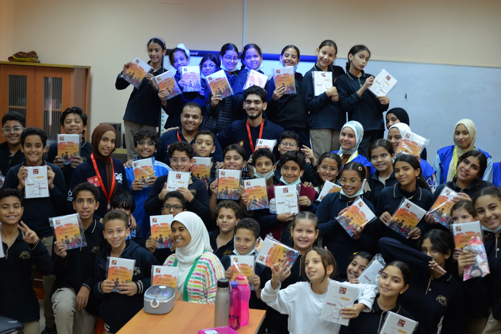 SPE Suez members conducting school outreach and booklet distribution